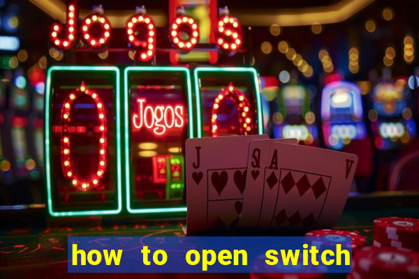 how to open switch oled game card slot