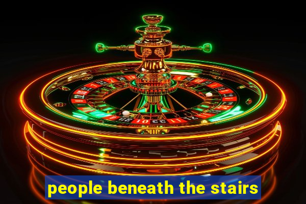 people beneath the stairs